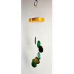 An agate windchime with a polished wood base strung with black and green agate slices.