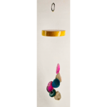 A multicolored agate windchime with a stained wood base.