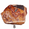 Wave Dolomite display slab displaying tan, red, orange, brown design with a brilliant polish.