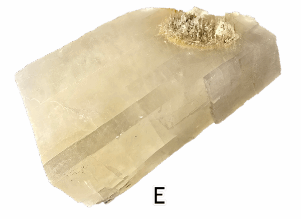 A large calcite mineral specimen with a cube structure, and clear.