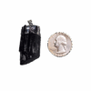 Black Tourmaline silver plated cap and bail pendant with a quarter for size comparison. It is larger than the quarter.