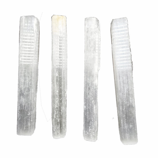 A group of 4 selenite sticks with a soft white glow.
