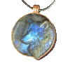 20260420_084105 Labradorite wolf medallion with copper lining and bail.