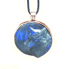 20260420_084339 Labradorite wolf medallion with copper lining and bail.